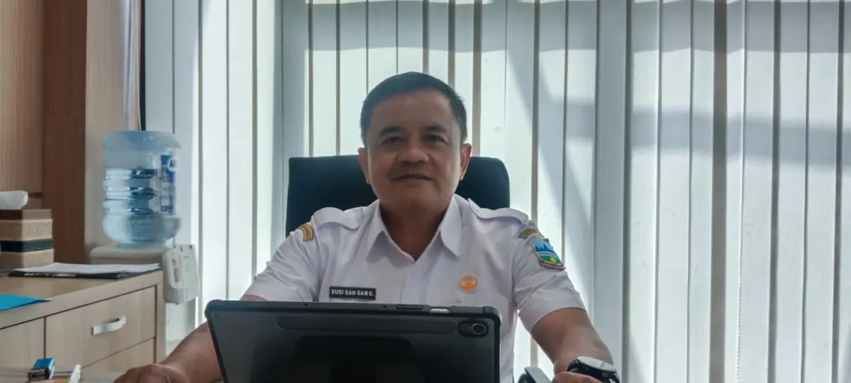 Kepala Dinas DPMPT Garut Budi Gan Gan,
